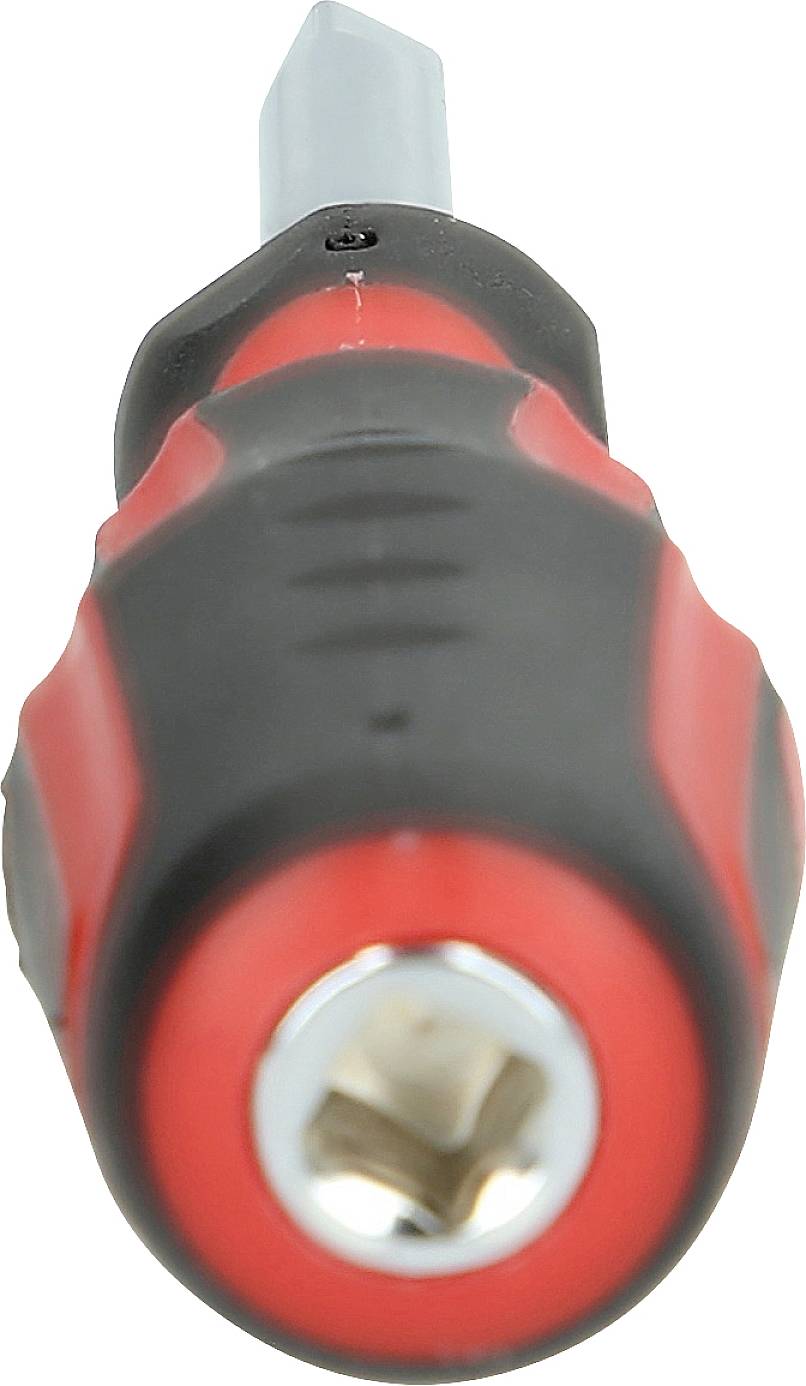 Zbliżenie wkrętaka z czerwono-czarnym uchwytem, trzymającego metalowy bit.