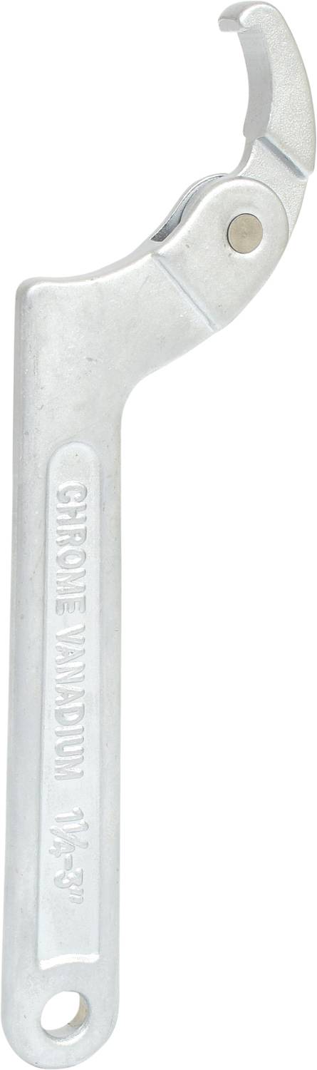 Srebrny klucz hakowy z napisem 'Chrome Vanadium 1 1/2"'. Narzędzie służące do dokręcania lub odkręcania nakrętek lub śrub.