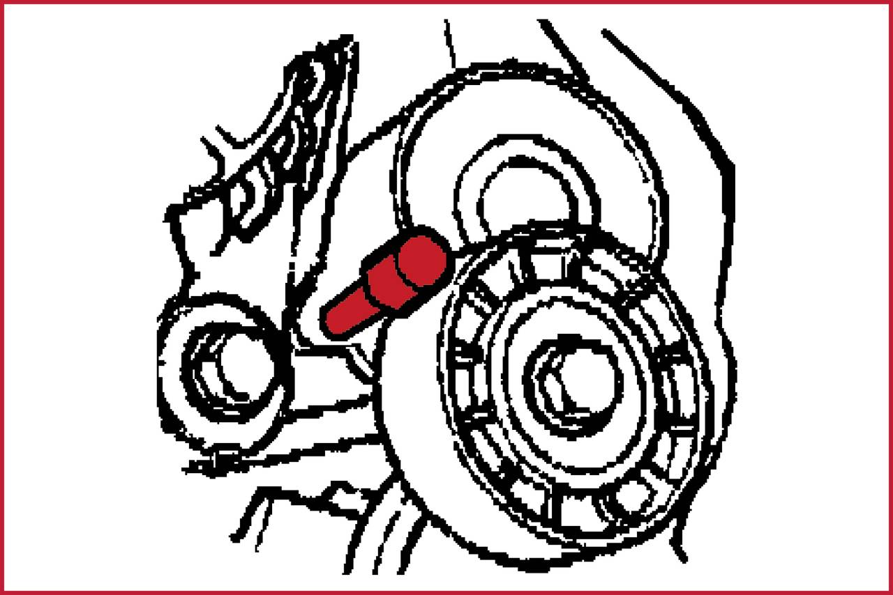 Techniczny rysunek silnika z zaznaczonym czerwonym elementem. Fokus skierowany jest na konkretny komponent w centrum.