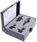 Czarny kufer z wyściółką piankową zawiera precyzyjnie ukształtowane narzędzia metalowe. Diagram na pokrywie przedstawia instrukcje montażowe.