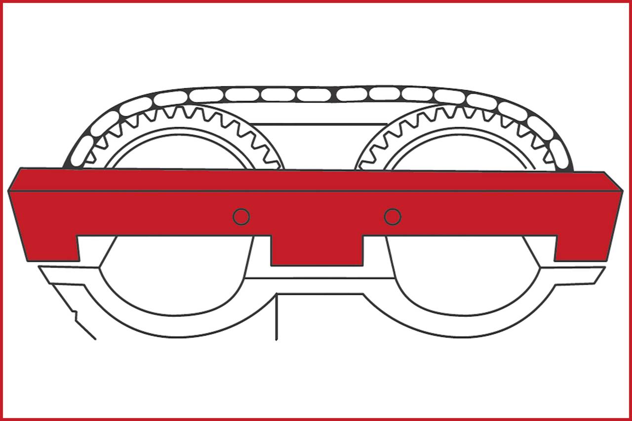 Techniczny diagram przedstawia czerwoną, prostokątną strukturę łączącą dwa koła zębate. Nad nią tworzy się łańcuch.