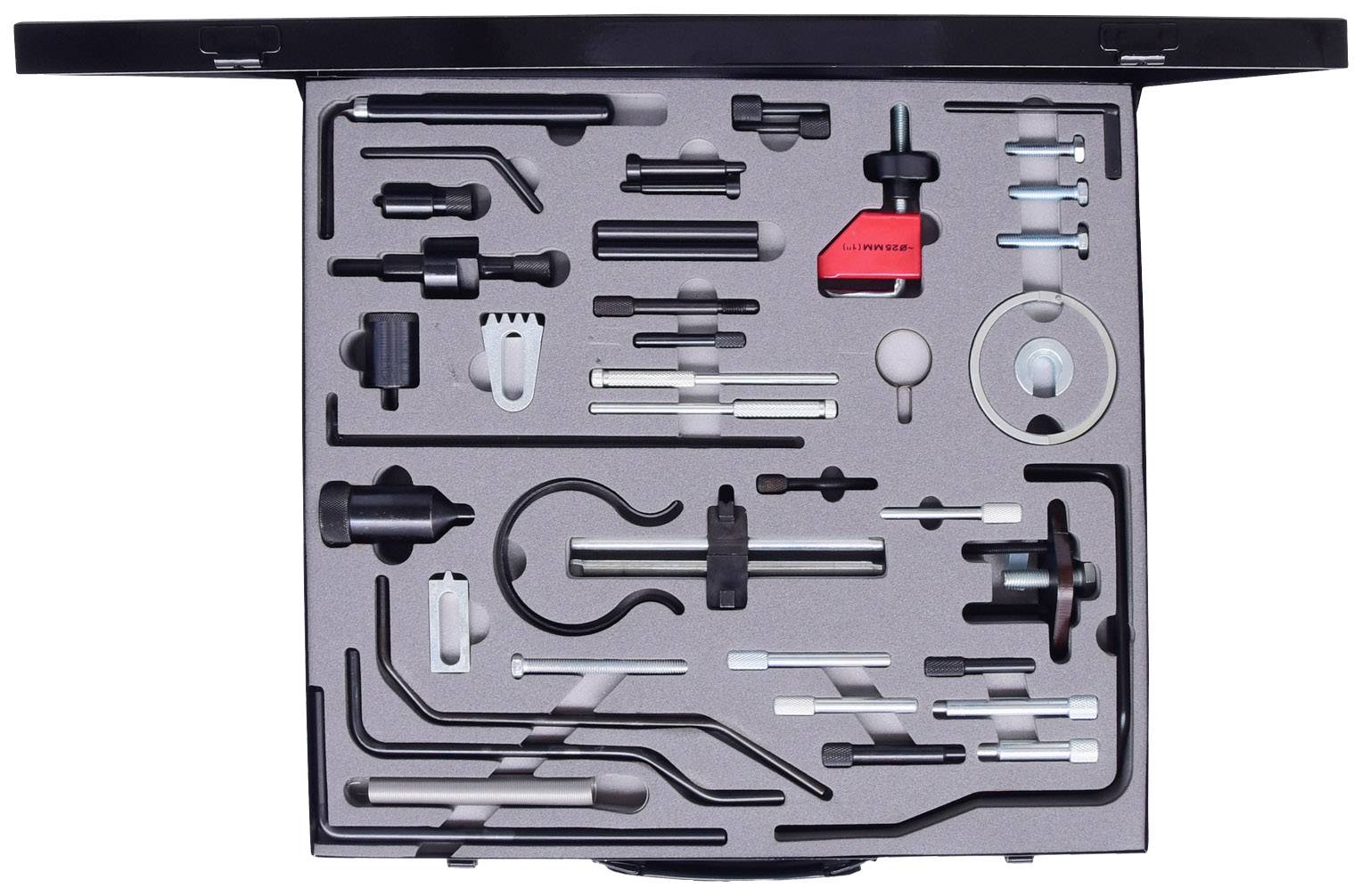 Szuflada z różnymi narzędziami do napraw, starannie ułożonymi w ukształtowanych przegródkach, obejmująca klucze i śrubokręty.