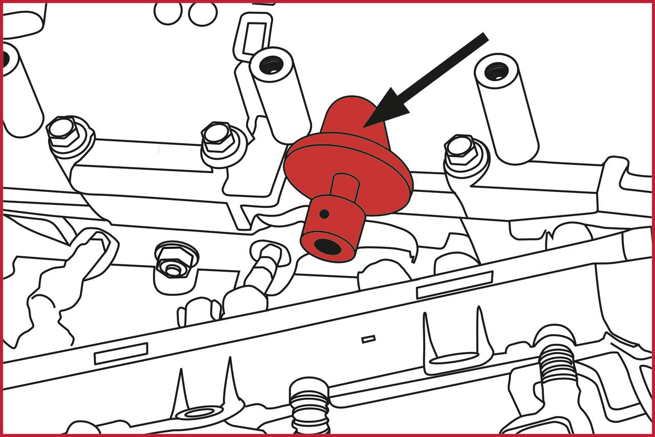 Rysunek techniczny elementu silnika, który wskazuje lokalizację czerwonego zaworu za pomocą strzałki. Ilustracja podkreśla umiejscowienie zaworu.