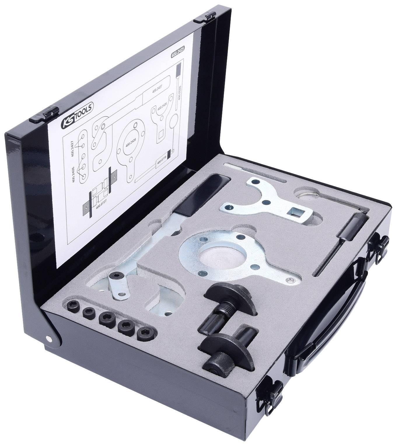 Zestaw narzędziowy z różnymi specjalistycznymi narzędziami do naprawy silnika, w tym elementami formowanymi i instrukcjami użycia.