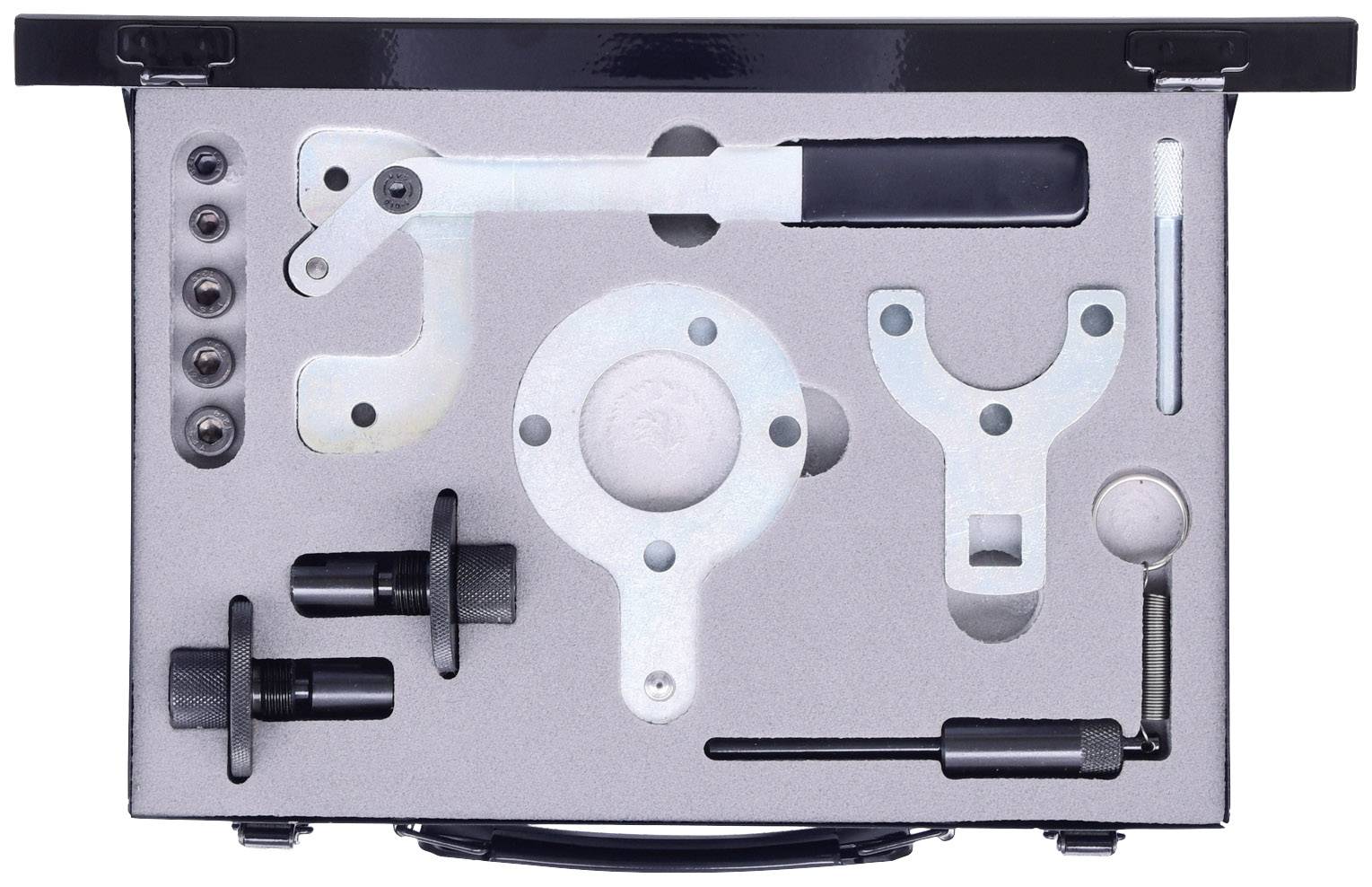 Zestaw narzędzi w wkładce piankowej. Zawiera dźwignie, śruby i uchwyty obrotowe, używane do prac naprawczych mechanicznych.