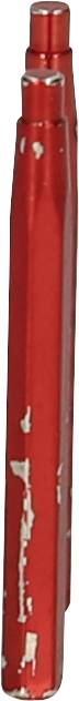 Zużyty czerwony śrubokręt, z którego farba już odpada. Narzędzie stoi pionowo i ma wyraźnie startą powierzchnię.