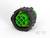 Okrągły, wielokolorowy element złącza z czarną obudową i zielonymi, okrągłymi elementami wewnętrznymi.