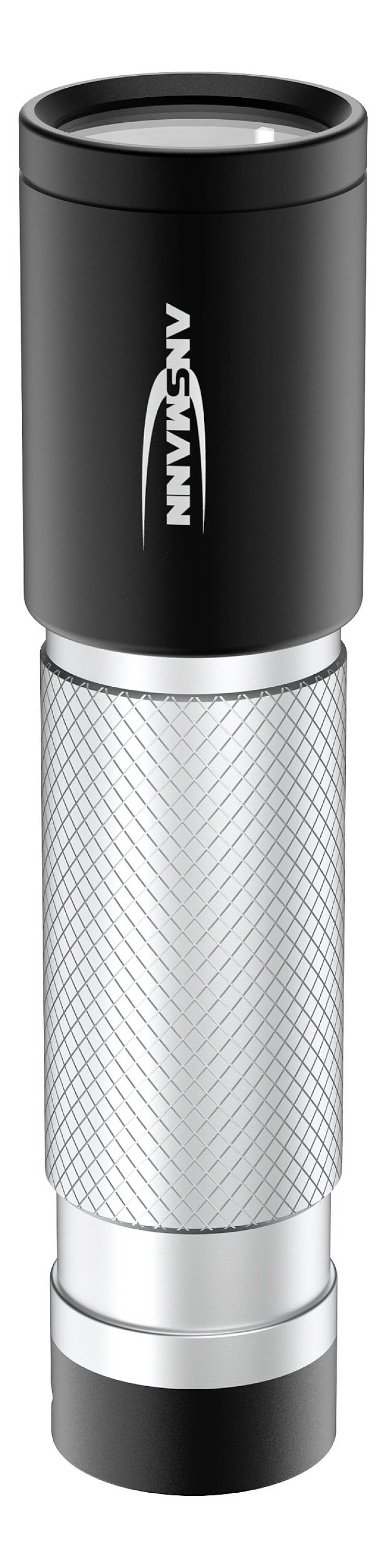 Czarna i srebrna latarka z napisem 'ANSMANN' na górnej części.