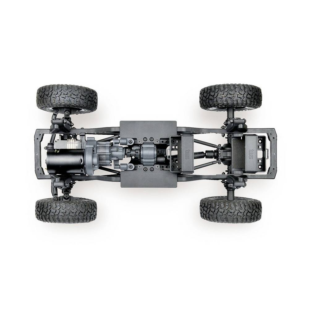 Widok podwozia modelu zdalnie sterowanego pojazdu z góry, z widocznymi silnikami, kołami i komponentami napędowymi.