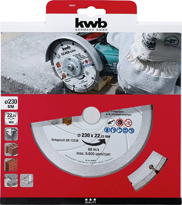 Tarcza tnąca kwb przecina blok betonowy. Opakowanie przedstawia tarczę do betonu, cegły i skał. 230 mm, otwór 22,23 mm.