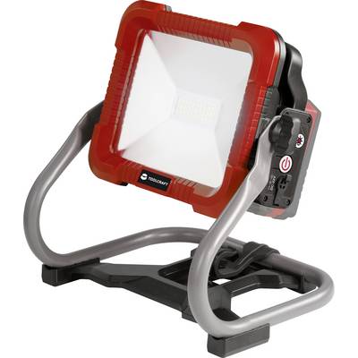 Czerwona lampa budowlana LED ze stabilnym stojakiem metalowym, odpowiednia do oświetlenia placu budowy.