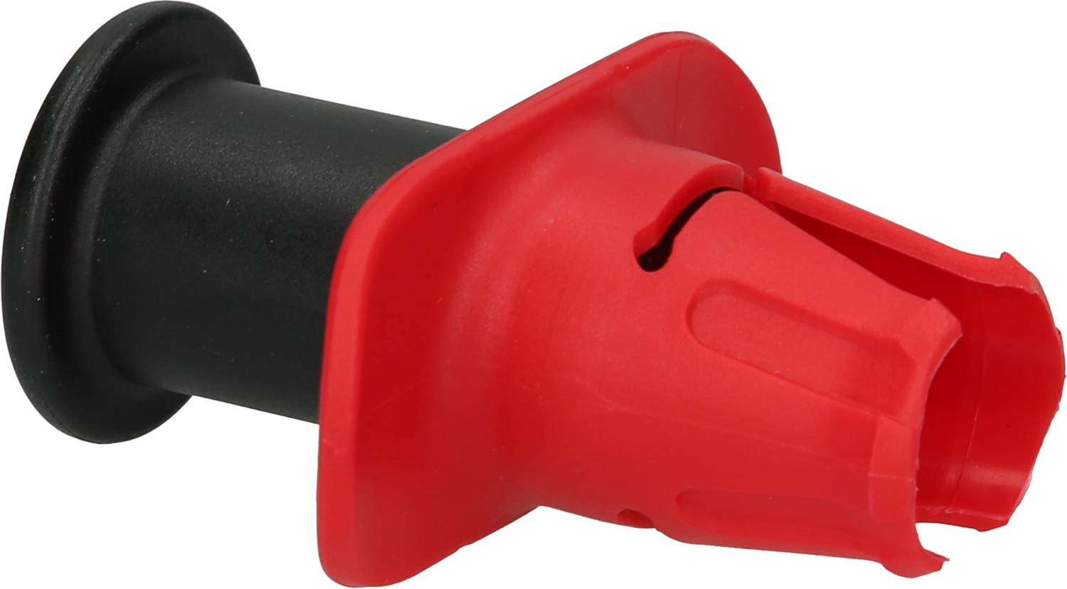 Czerwony kołek plastikowy z czarną podstawą, typowy osprzęt do instalacji elektrycznych i przepustów kablowych.