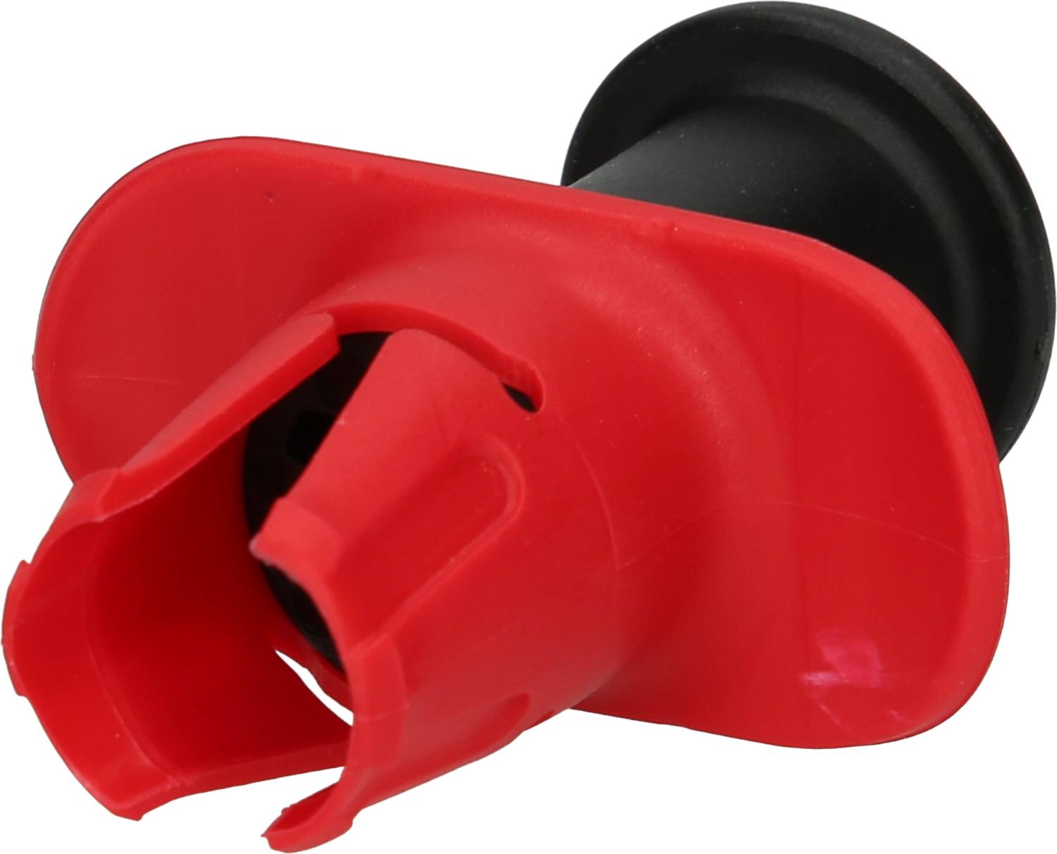 Okrągłe czerwone opakowanie plastikowe z czarną wewnętrzną częścią, często stosowane jako zawór zamykający w systemach utylizacji lub jako zabezpieczenie.