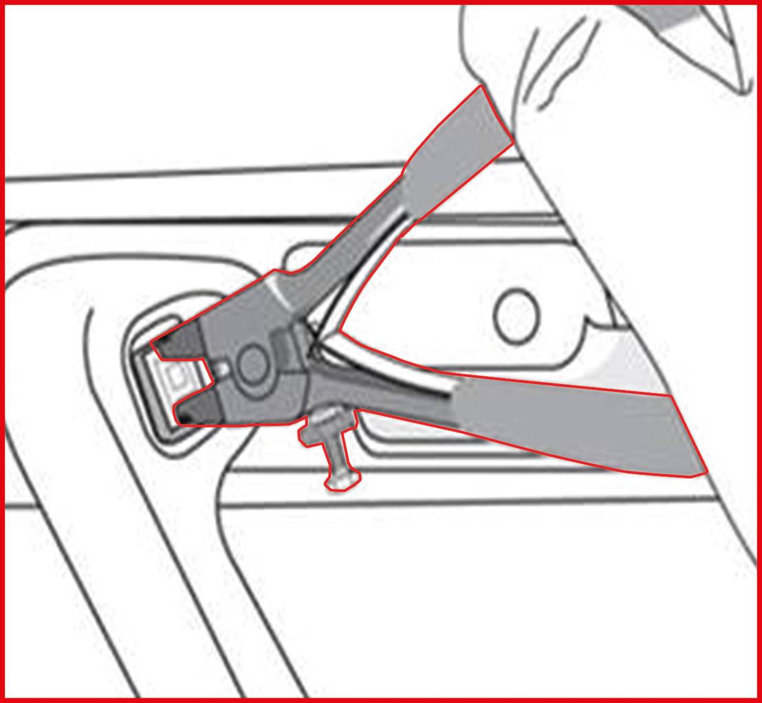Szczypce przecinają drut pod kątem. Materiał opakowaniowy zostaje przecięty. Zbliżenie na narzędzie podczas pracy.