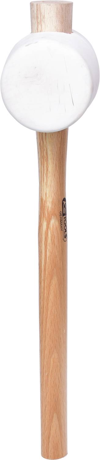 Duży drewniany młotek z białą główką. Stosowany głównie do delikatnych prac rzemieślniczych.