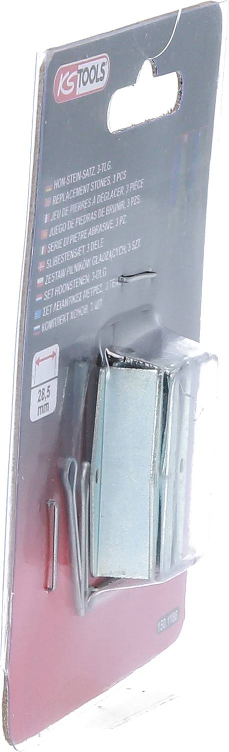 Zawieszka na opakowanie z metalowymi uchwytami ściennymi i gwoździami, logo marki 'KS TOOLS' w lewym górnym rogu. Zawiera instrukcję montażu na odwrocie.