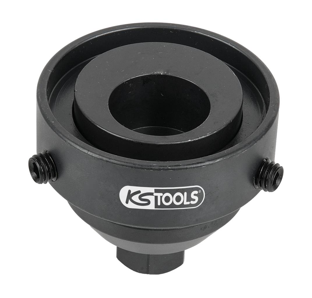 Czarne metalowe narzędzie firmy KS Tools, okrągłe, z dwoma śrubami po bokach i centralnym wycięciem.