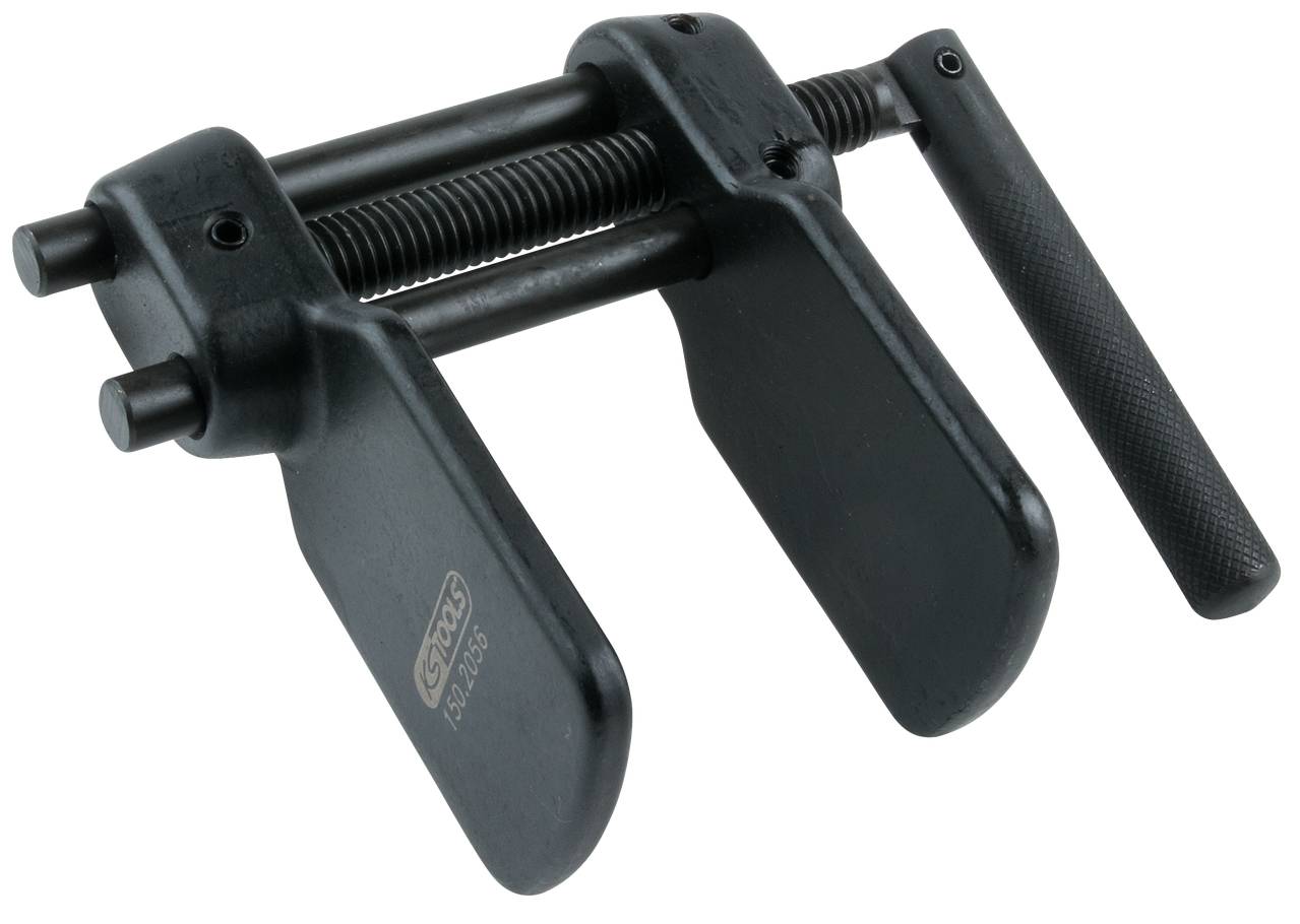 Ścisk śrubowy z czarną metalową ramą i uchwytem. Używany do mocowania lub zaciskania przedmiotów w warsztacie.