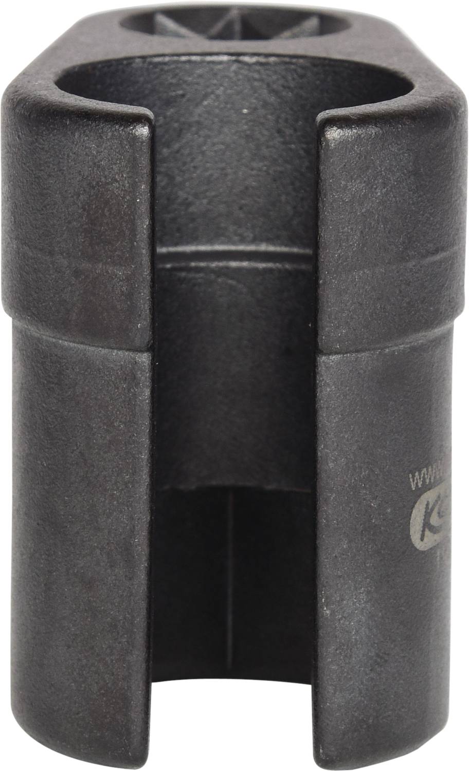 Czarny, cylindryczny element z tworzywa sztucznego z otworem od góry. Może to być element łączący lub mocujący.