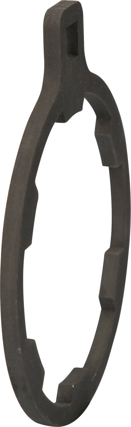 Metalowy pierścień z nieregularnymi wewnętrznymi wcięciami i małym odstającym języczkiem u góry. Prawdopodobnie element mechaniczny.