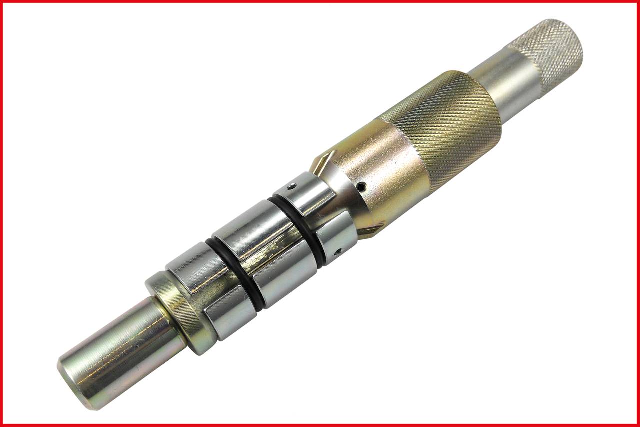 Cylindryczny metalowy przyrząd precyzyjny z ryflowaną powierzchnią uchwytu i kilkoma wzajemnie zazębiającymi się sekcjami.