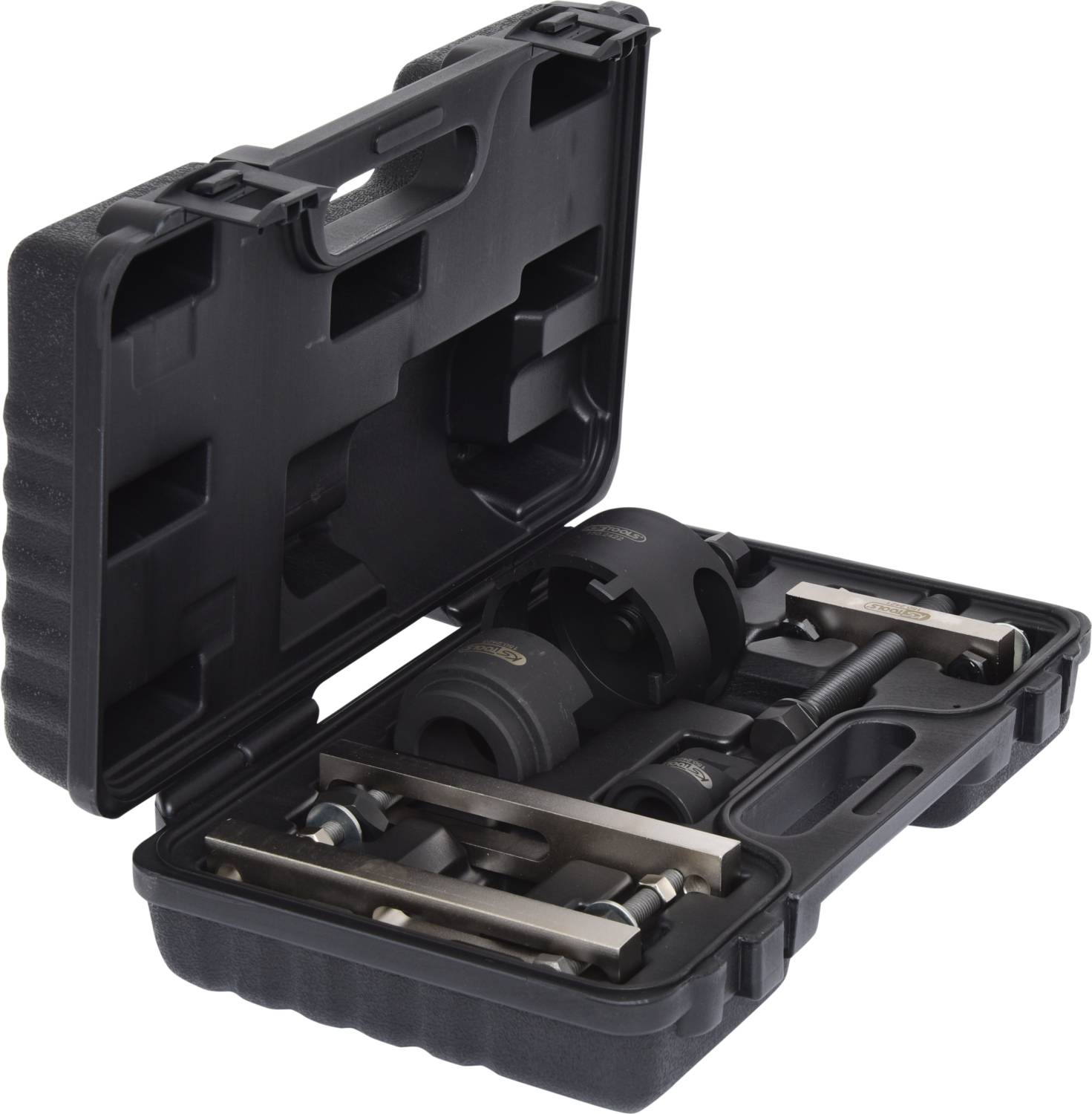 Otwarte czarne plastikowe pudełko z różnymi wiertłami i narzędziami starannie ułożonymi w ukształtowanych uchwytach.