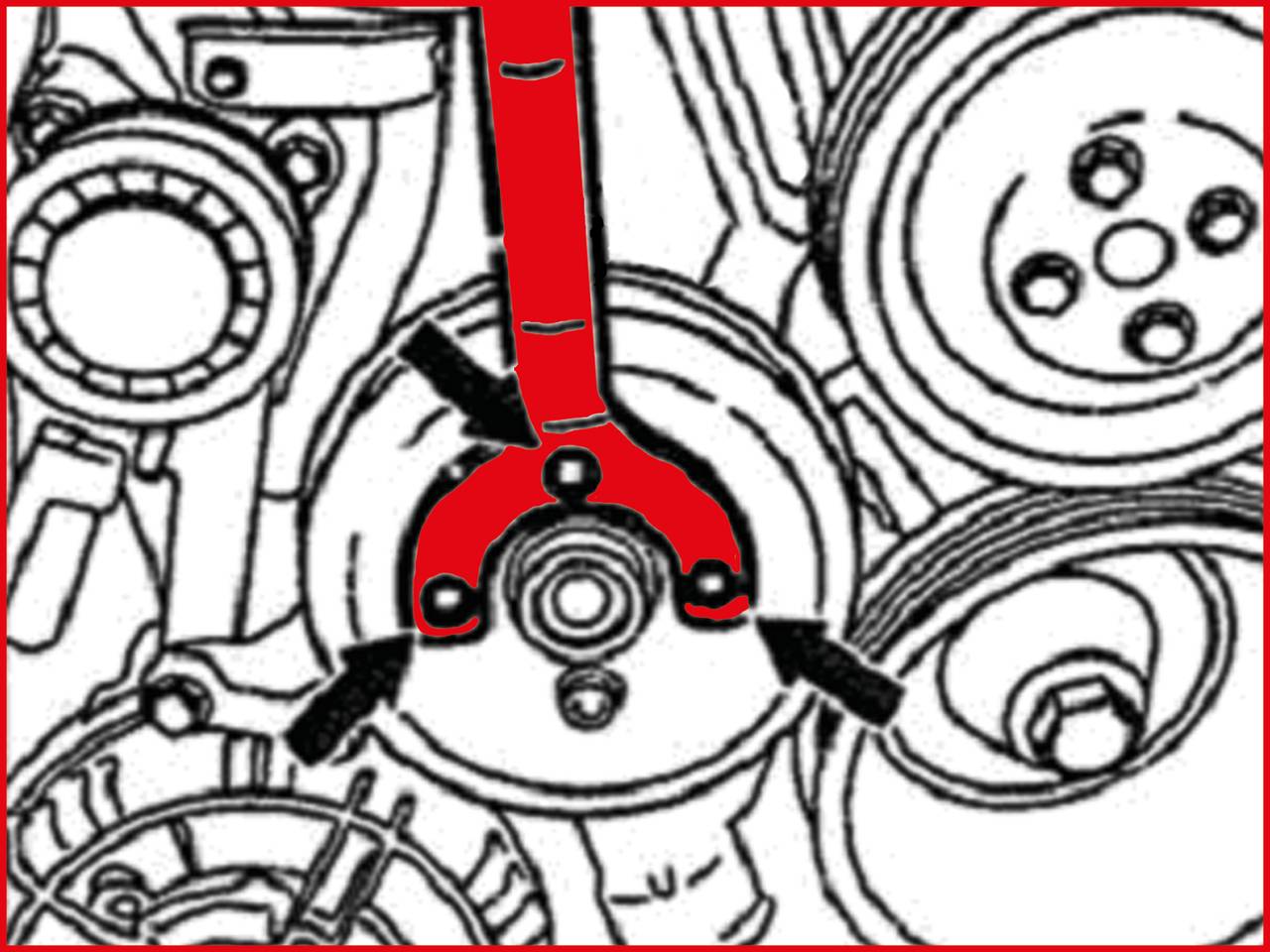 Czerwone narzędzie przykłada się do wkrętu w skomplikowanej części maszyny, otoczone kołami zębatymi i elementami mechanicznymi.