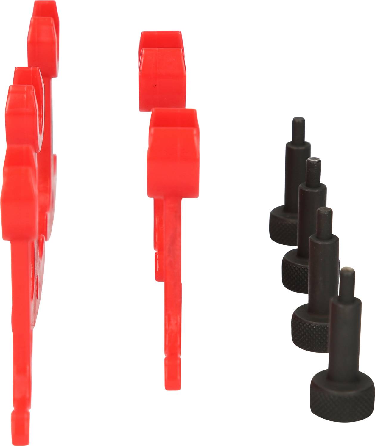 Czerwone i czarne narzędzia, w tym pozycjonery i kołki montażowe, prawdopodobnie używane do naprawy silnika samochodowego.