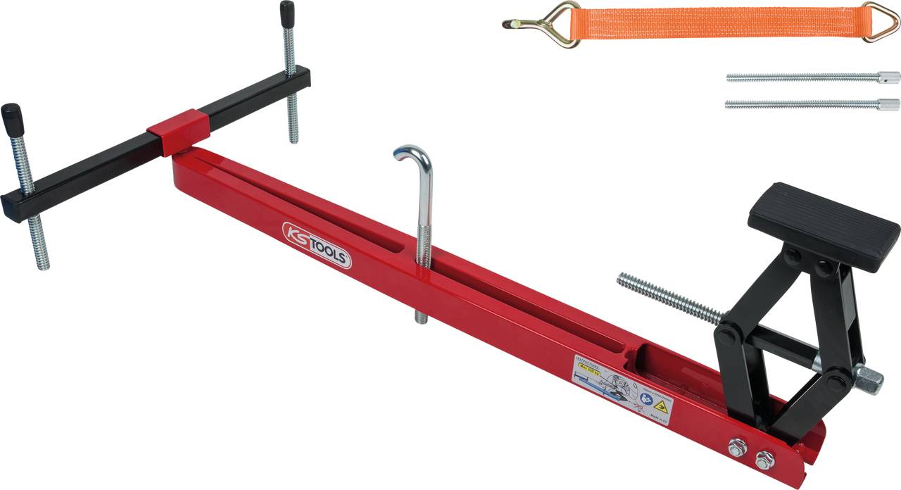 Czerwony poprzeczny dźwigar dźwigowy silnika z hakiem. Używany do podparcia lub mocowania silnika podczas napraw. Akcesoria w prawym górnym rogu.