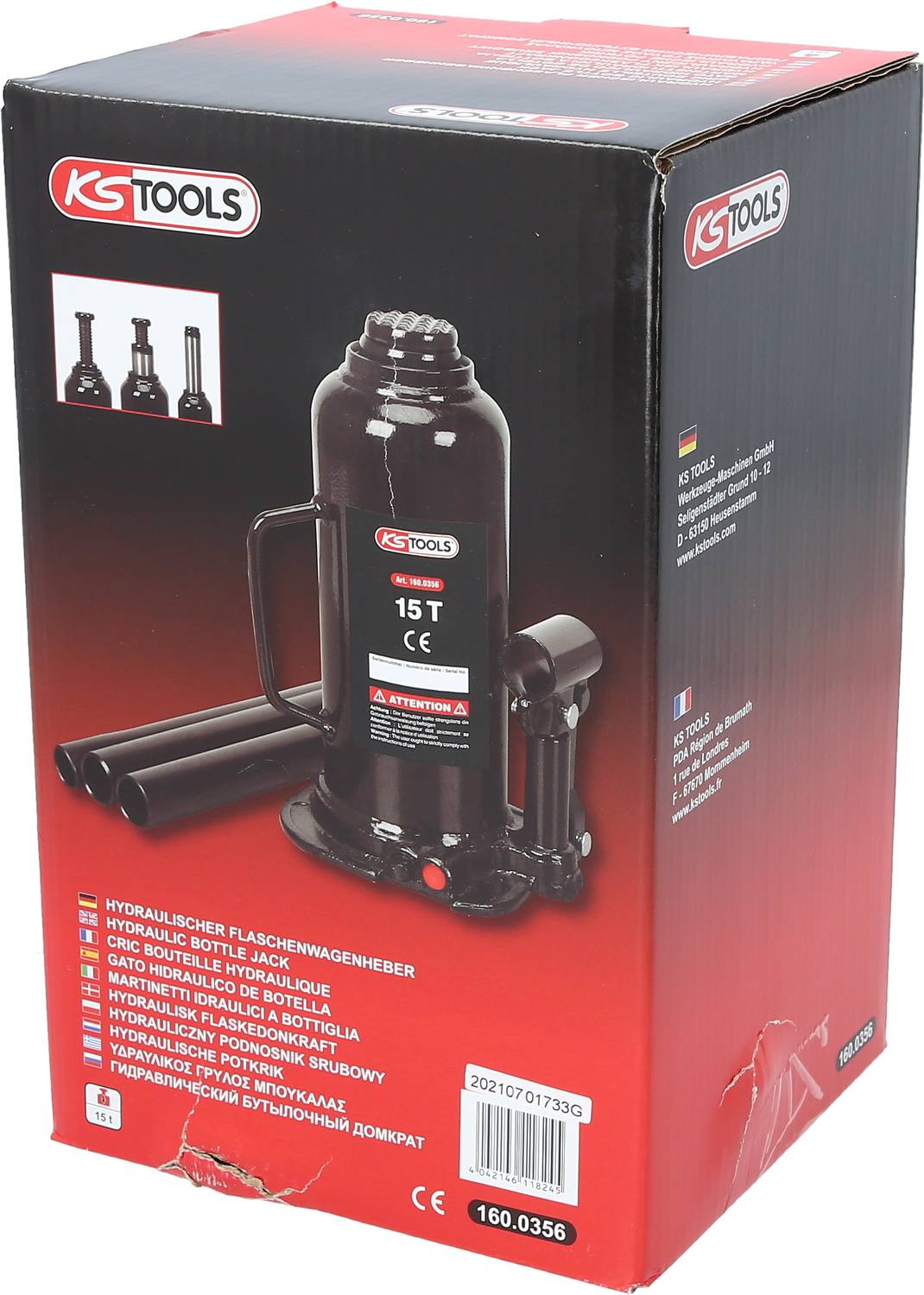 Czerwone pudełko kartonowe podnośnika hydraulicznego marki KS Tools z ilustracją produktu, szczegółami technicznymi i wielojęzycznymi logotypami.