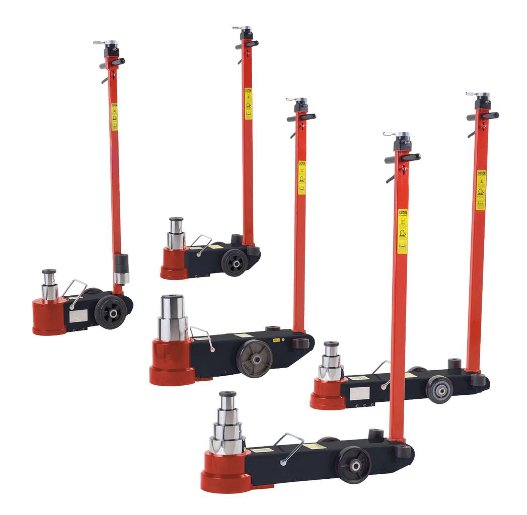 Kilka czerwonych, pneumatycznych podnośników samochodowych o różnych rozmiarach i wysokościach, ustawionych obok siebie w jednym rzędzie.