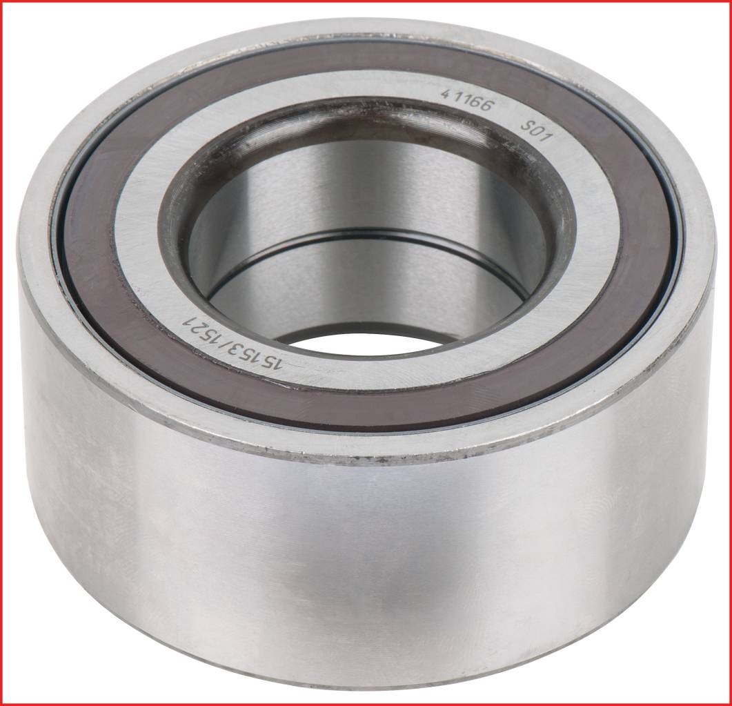 Cylindryczne łożysko toczne z srebrnym korpusem metalowym i brązowym pierścieniem wewnętrznym. Jest często stosowane w maszynach do podtrzymywania obracających się elementów.