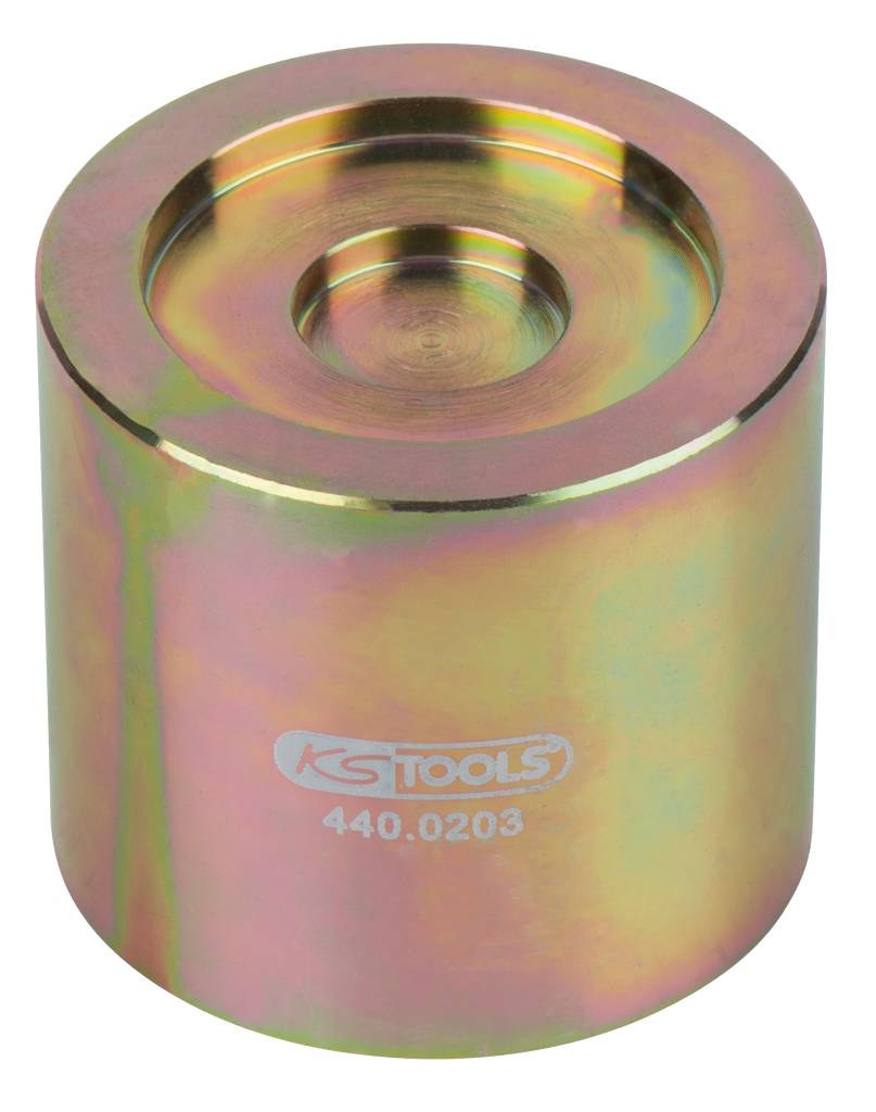 Cylindryczny metalowy przyrząd z napisem 'KS TOOLS 440.0203'. Prawdopodobnie element używany podczas prac mechanicznych lub napraw.