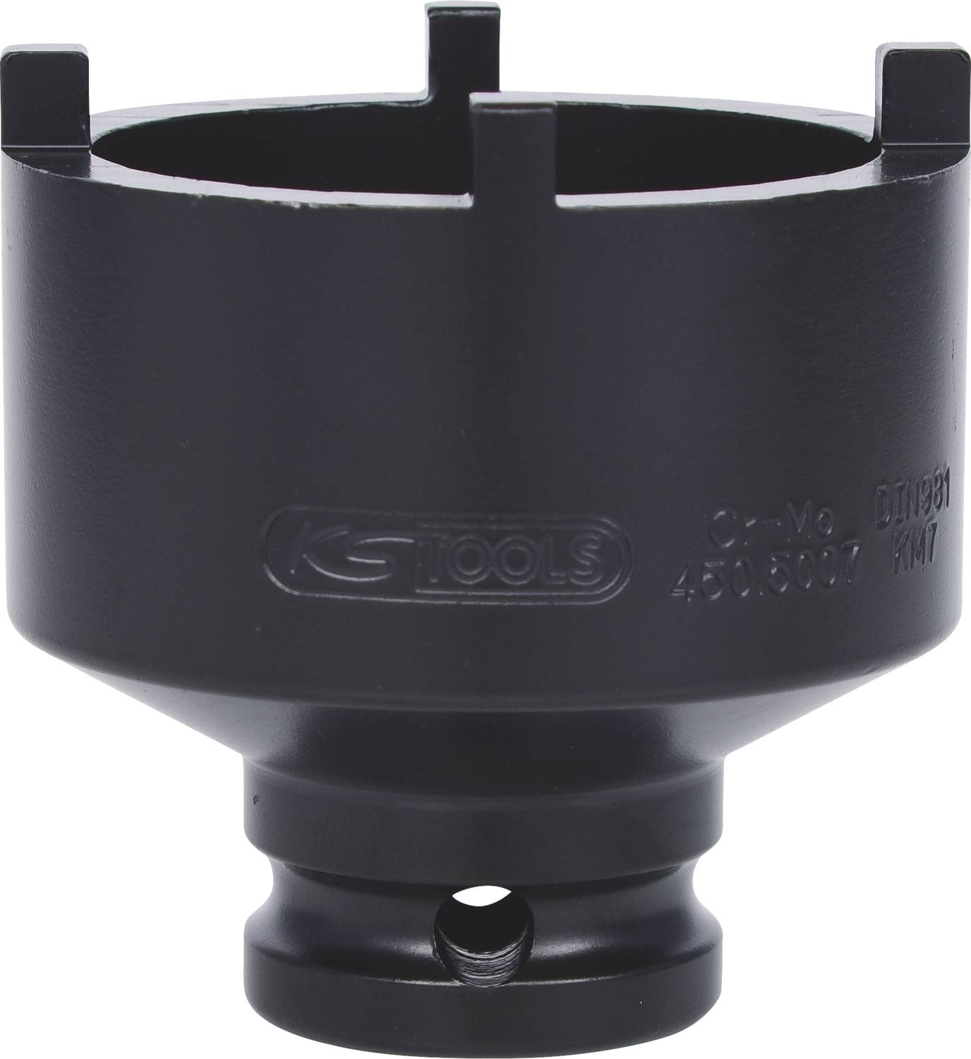 Czarne narzędzie o głębokich wycięciach i cylindrycznym kształcie, prawdopodobnie specjalistyczne narzędzie dla mechaników.