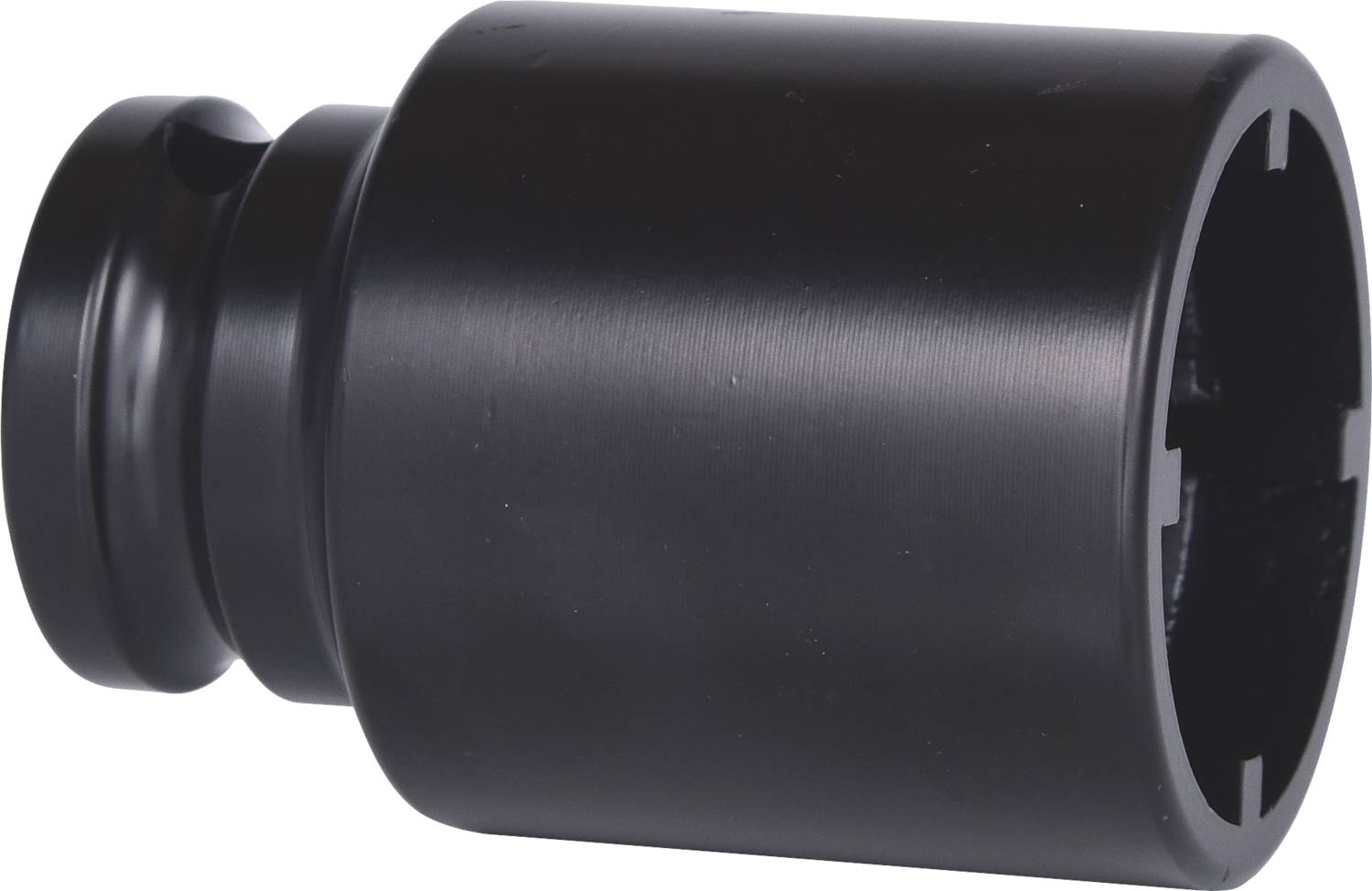 Czarny cylindryczny metalowy przyrząd z szerszym końcem, używany do mocowania połączeń śrubowych lub wtykowych.