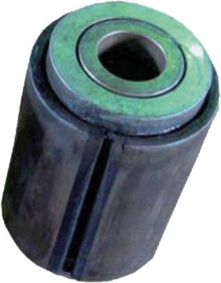 Cylindryczny element maszynowy z centralnym otworem, otoczony zielonkawym materiałem. Prawdopodobnie łożysko lub tuleja.