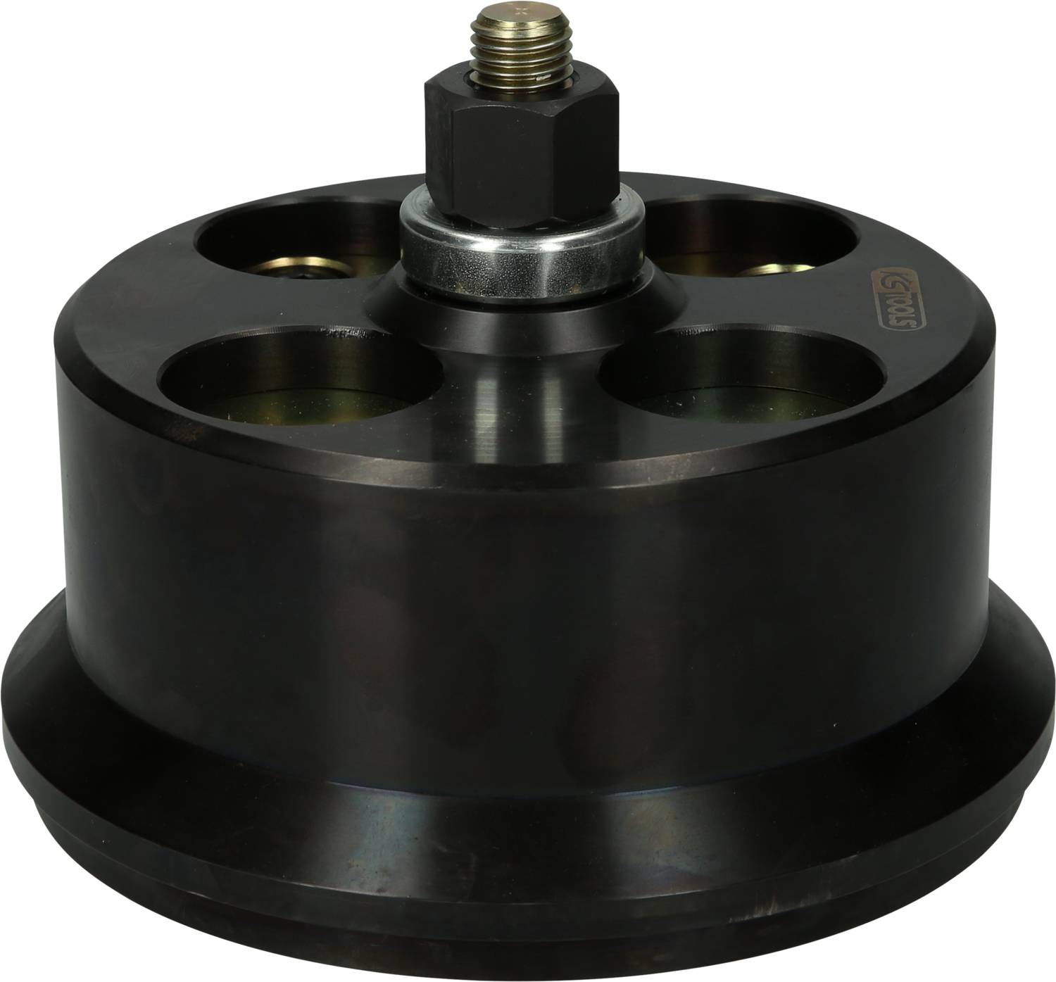 Czarna, okrągła część maszynowa z wieloma otworami i centralną śrubą na górze, stojąca na jasnej powierzchni.