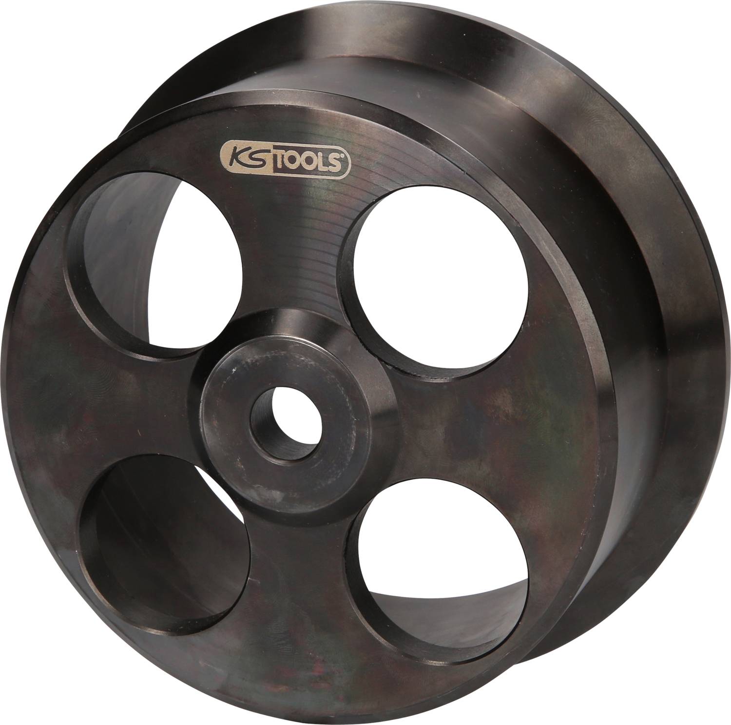Okrągłe narzędzie metalowe z czterema dużymi otworami, nadające się do zastosowań technicznych lub mechanicznych.