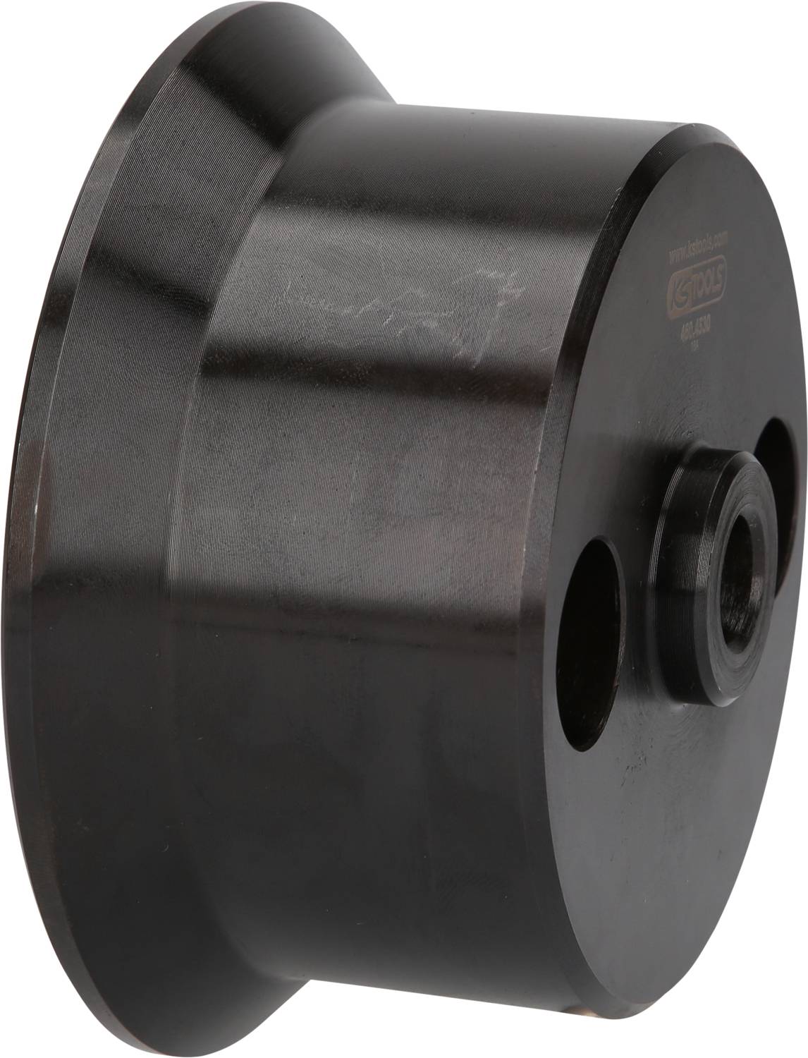 'Czarna część plastikowa o kształcie cylindrycznym z kilkoma otworami po bokach.'