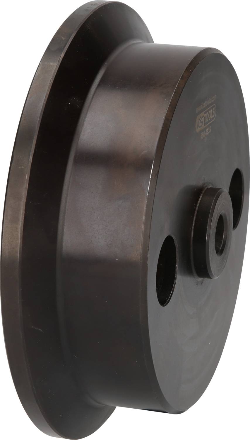 Czarne koło z dwoma otworami i centralną osią, prawdopodobnie element maszyny, sfotografowane z boku.