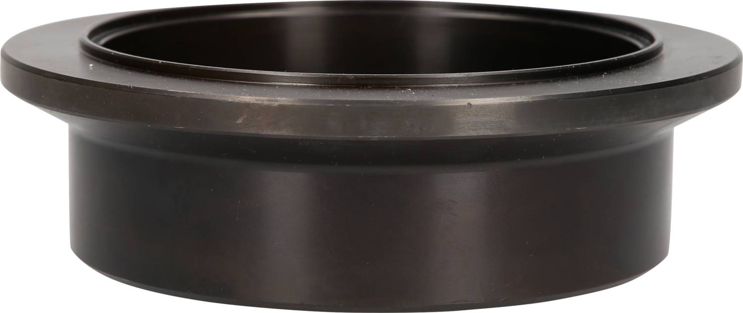 Okrągły, czarny element o płaskiej, szerokiej górnej krawędzi, przypominający pokrywkę lub osłonę.