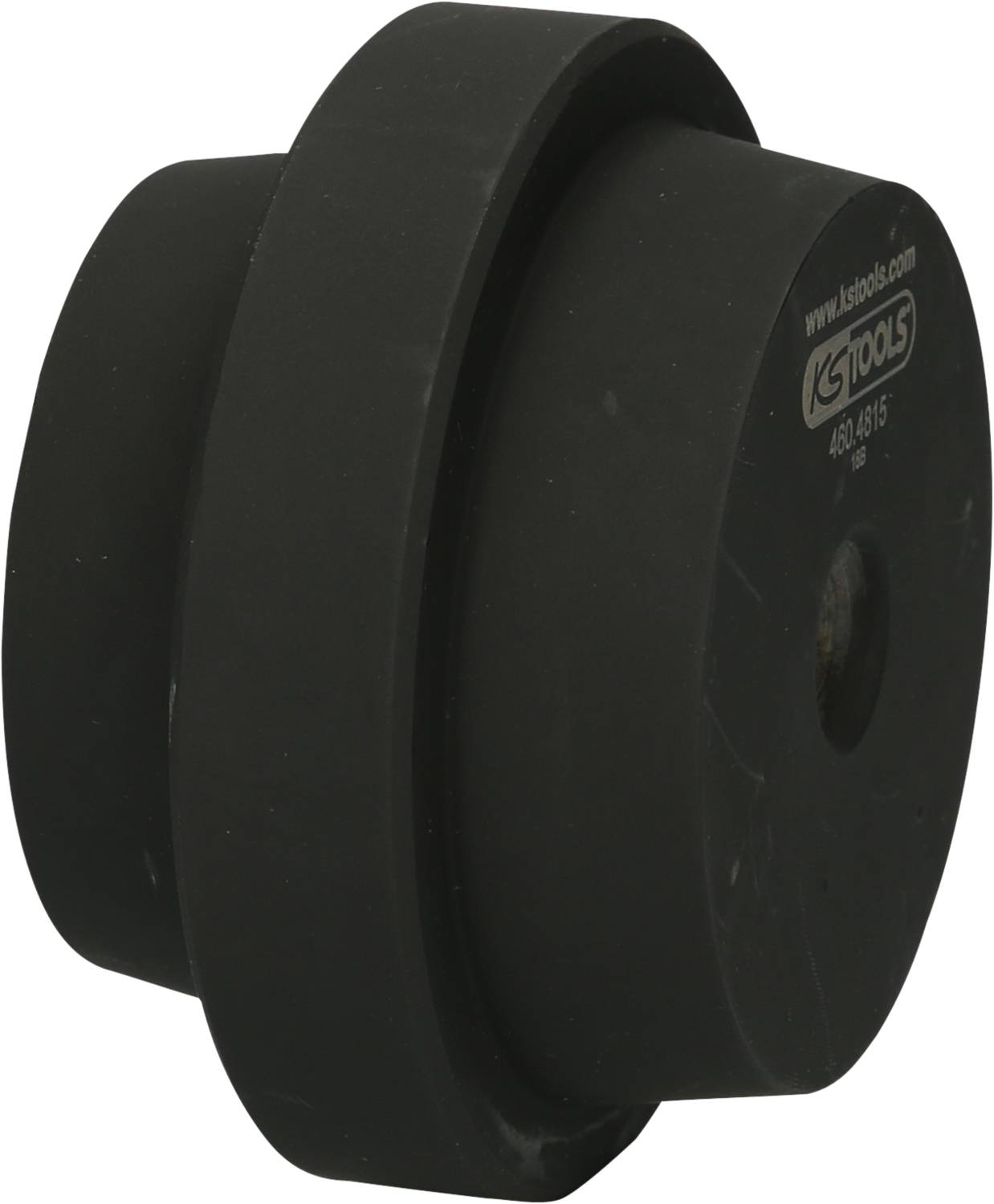 Czarny, okrągły element narzędziowy z centralnym otworem, wyprodukowany przez KS Tools. Wydaje się wytrzymały i odpowiedni do użycia w maszynach przemysłowych.