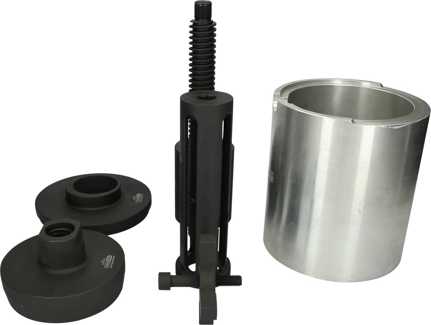 Zestaw narzędzi do serwisu pojazdów ze śrubą napinającą, dwoma elementami dociskowymi i srebrną obudową osłonową ułożonymi obok siebie.