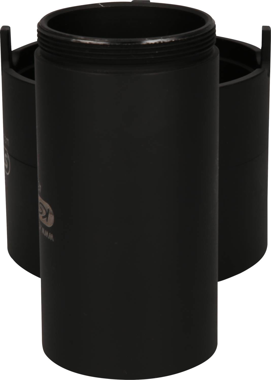 Czarny cylindryczny obiekt o gładkiej powierzchni. Wygląda przemysłowo, prawdopodobnie jest to pojemnik lub tuleja.