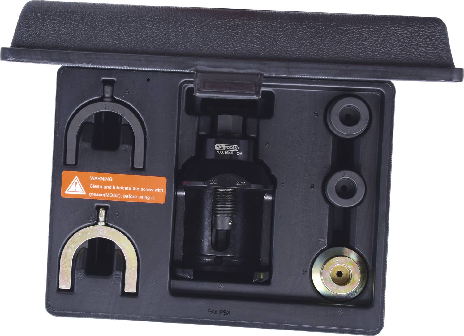 Zestaw narzędzi do demontażu przegubów kulowych. Zawiera ściągacze rozciągające i ściskające oraz imadło. Ostrzeżenie dotyczące smarowania.