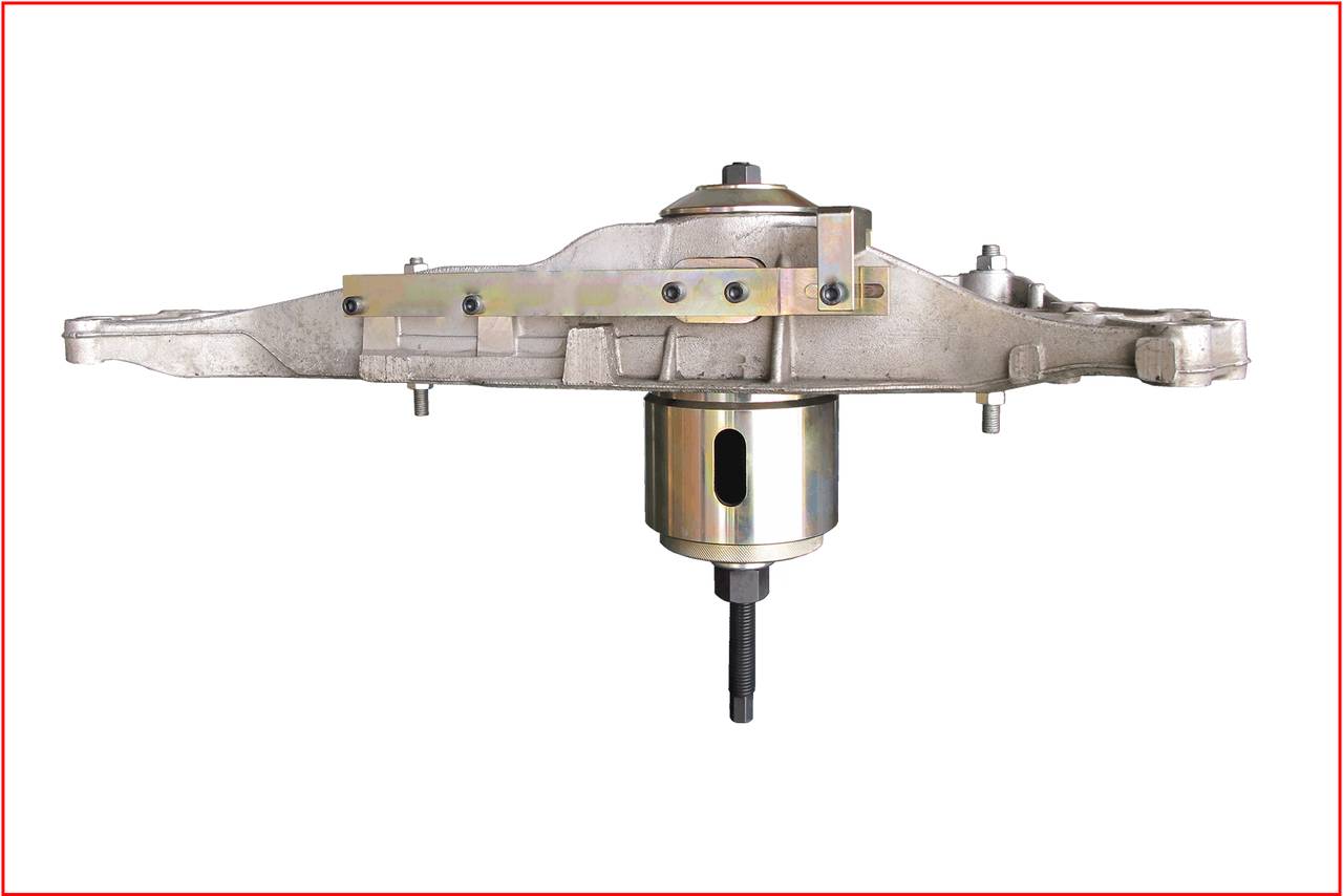 Metalowy mechanizm przekładniowy z widoczną osią i płytą mocującą, prawdopodobnie stanowiący część większej struktury maszynowej.