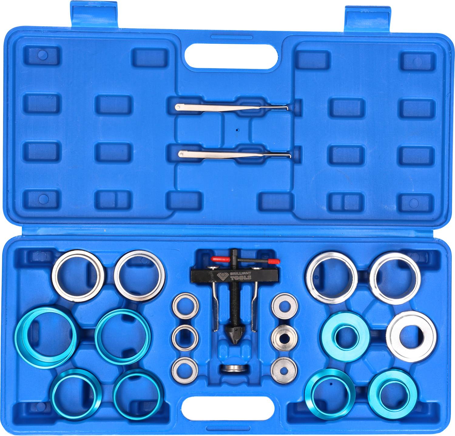 Niebieski skrzynka narzędziowa z tarczami pilarskimi i ściągaczami łożysk. Rozmieszczenie wskazuje na różne rozmiary. Odpowiednia do napraw.