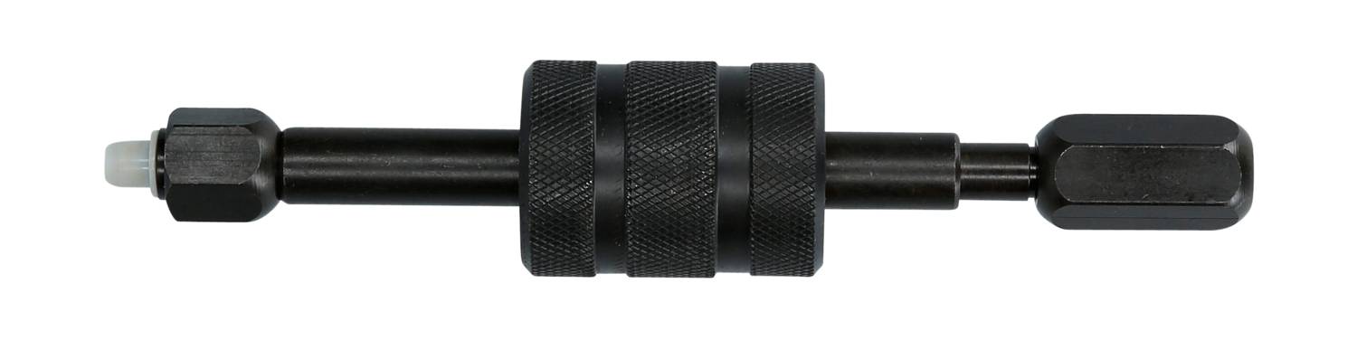 Czarny metalowy przyrząd, prawdopodobnie wyciągacz, z dwoma karbowanymi uchwytami i sześciokątną nakrętką na jednym końcu.