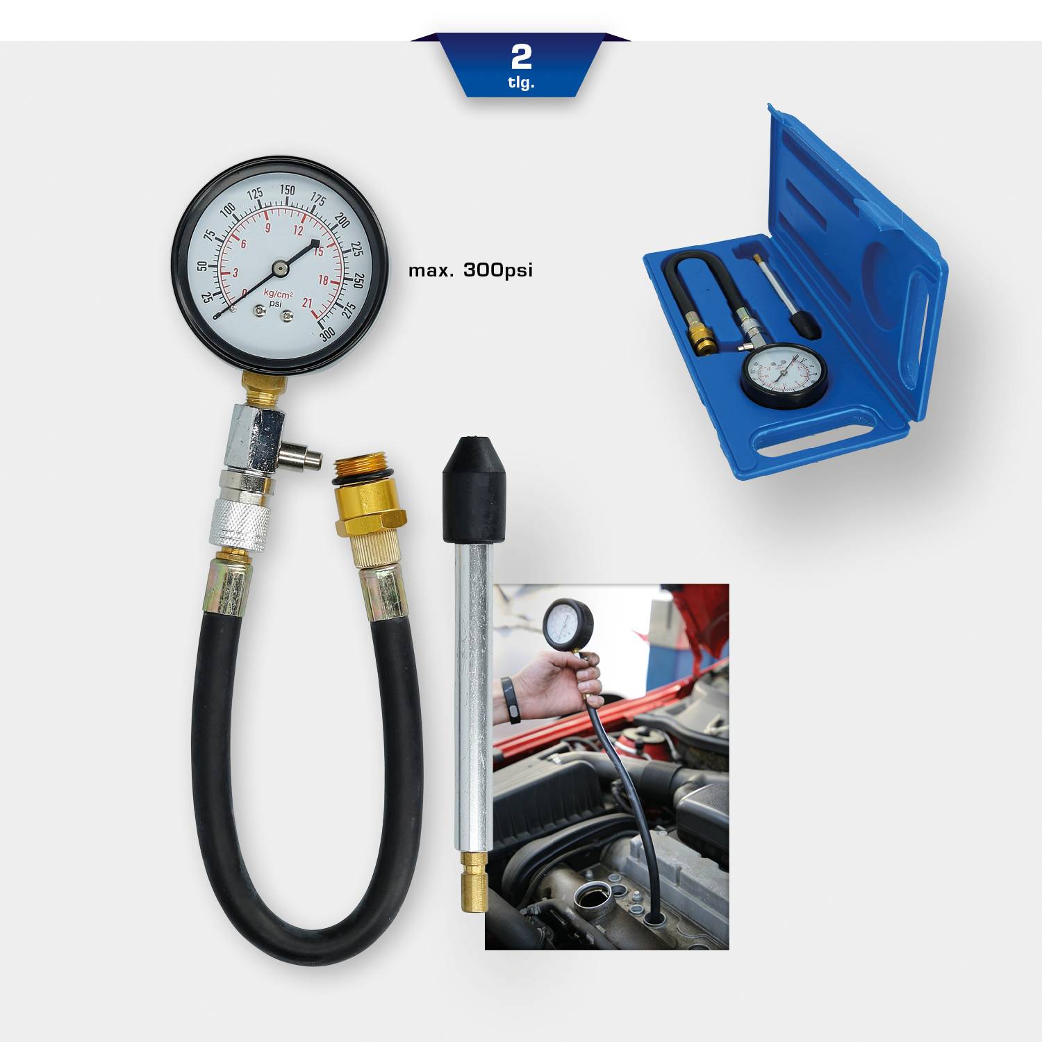 Zestaw do pomiaru ciśnienia, mieszczący maksymalnie 300 psi, jest pokazany w otwartej niebieskiej walizce i używany przy silniku.