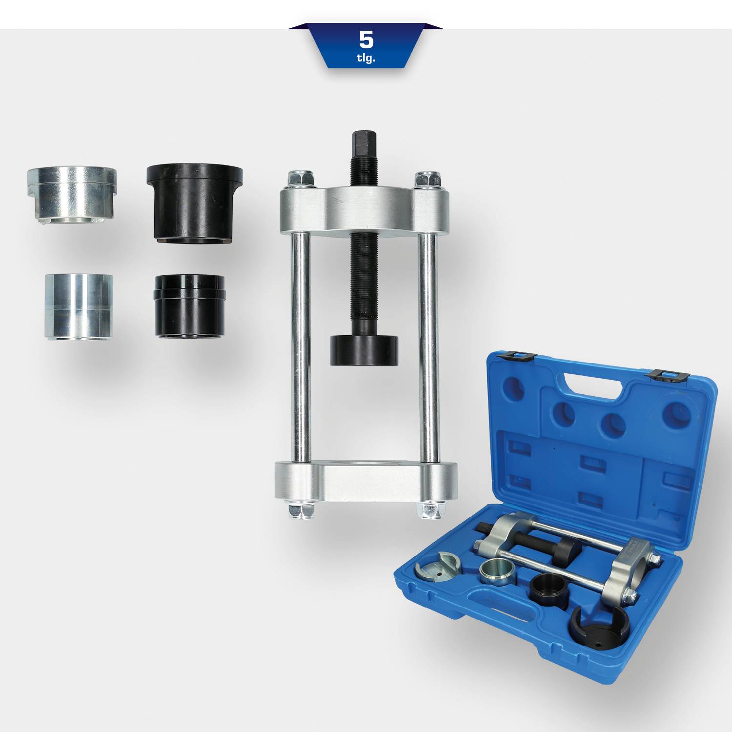 Zestaw narzędzi w niebieskim pudełku z różnymi elementami metalowymi. Zawiera prasę ze śrubą i adapterem do różnych zastosowań.